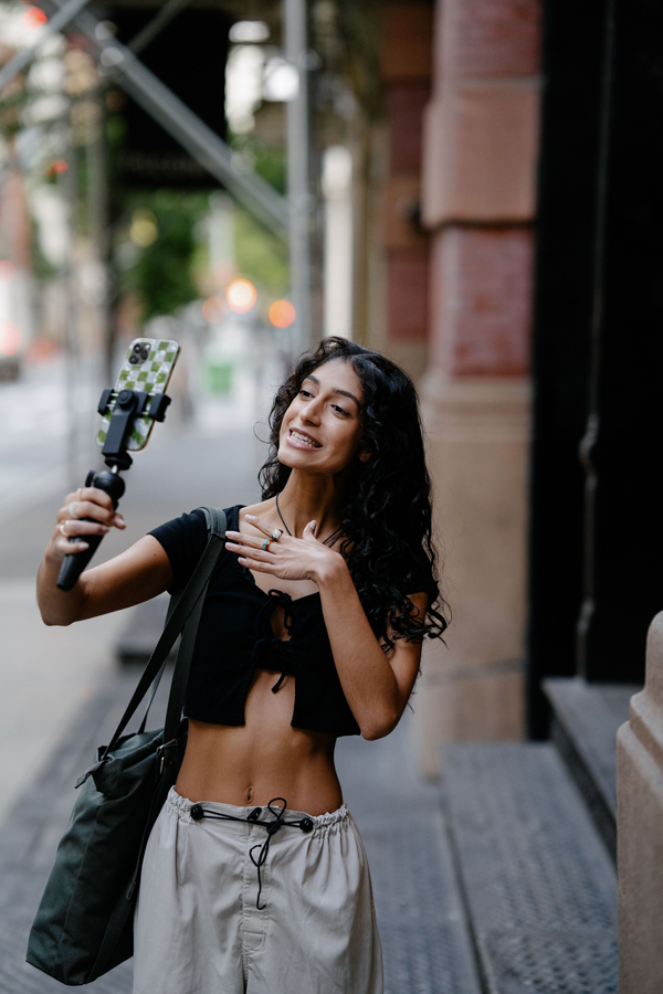 Creator taking selfie video on the street
