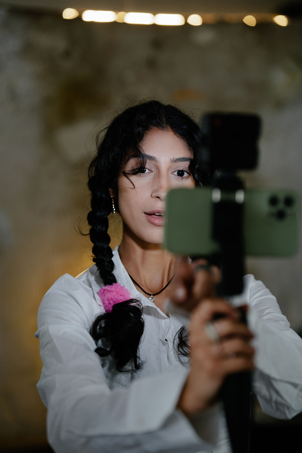 Creator filming with phone